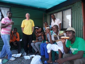 Fr Gerald with beneficiaries of M-Care