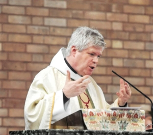 Fr Stewart saying Mass
