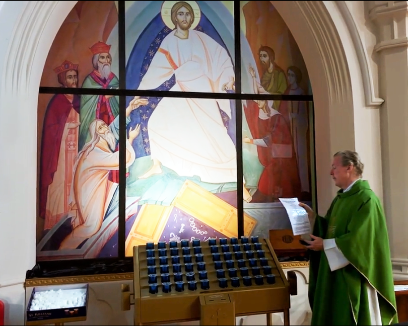 Canon Andrew Headon with Covid memorial window