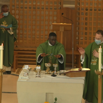 Paschal extends hands over chalices