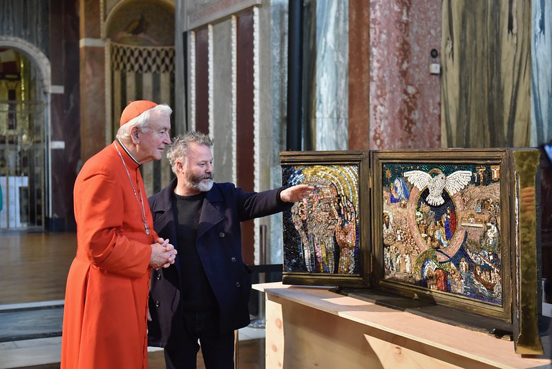 Pete Codling talks to Cardinal Nichols about the artwork in February (courtesy of Catholic Church)