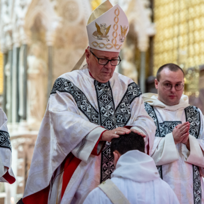 Bishop lays hands on Joseph'shead