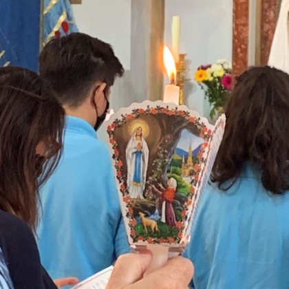 Young people holding icon