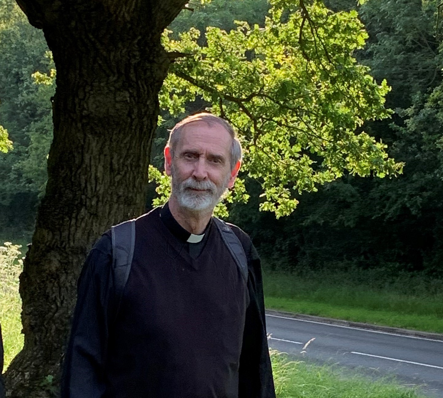 Bishop walking in trees