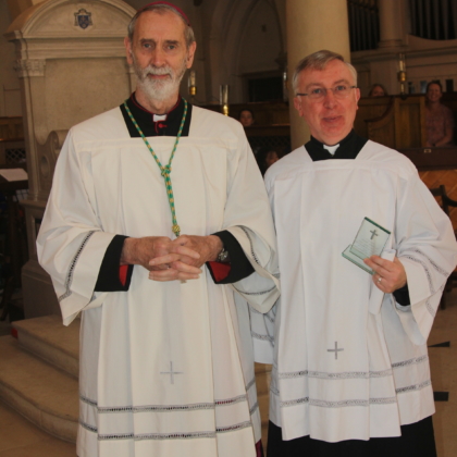 Bishop and Fr Martin in clerical dress