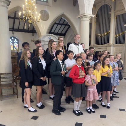 Group of children with Bishop in Cathedral