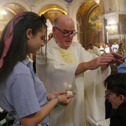 Priest laying on hands