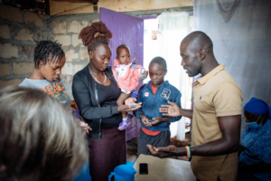 Linet with children praying