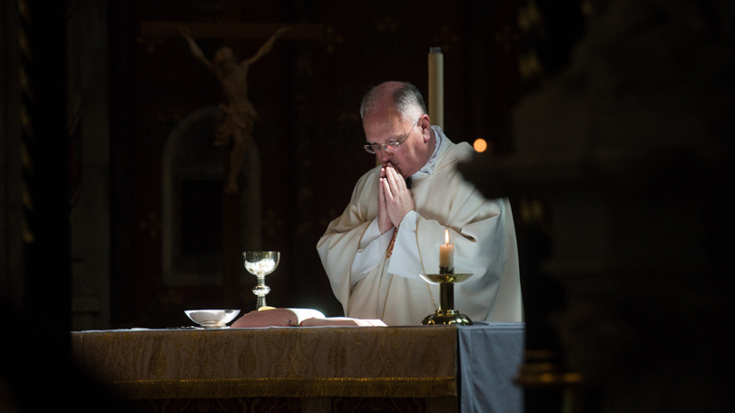 Priest at altar