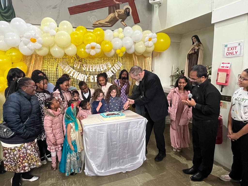 St Stephen's Bishop cuts cake